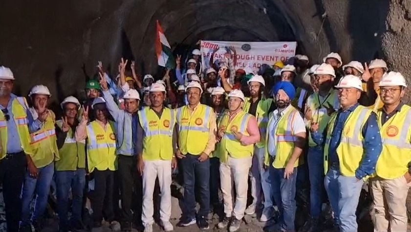 Workers celebrate the breakthrough of the Adit to Tunnel no. T-01 of the ongoing Sivok-Rangpo Rail Project (SRRP) located in the Darjeeling district of West Bengal on November 29. (Photo Courtesy: CPRO NFR).